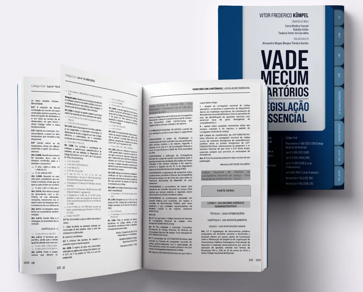 Livro aberto com diagramação de miolo em texto denso e capa azul